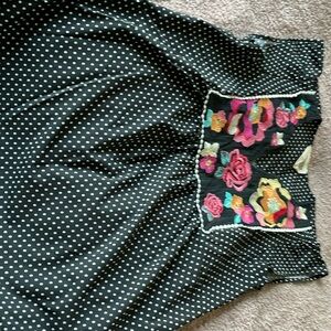 Black top with embroidered flowers on front